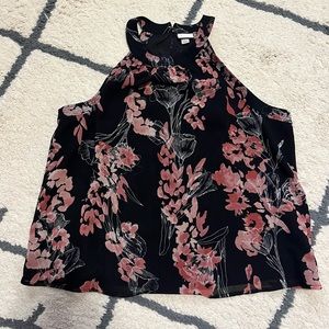 A new day high neck tank. Black and pink print. Size L sheer fabric line…